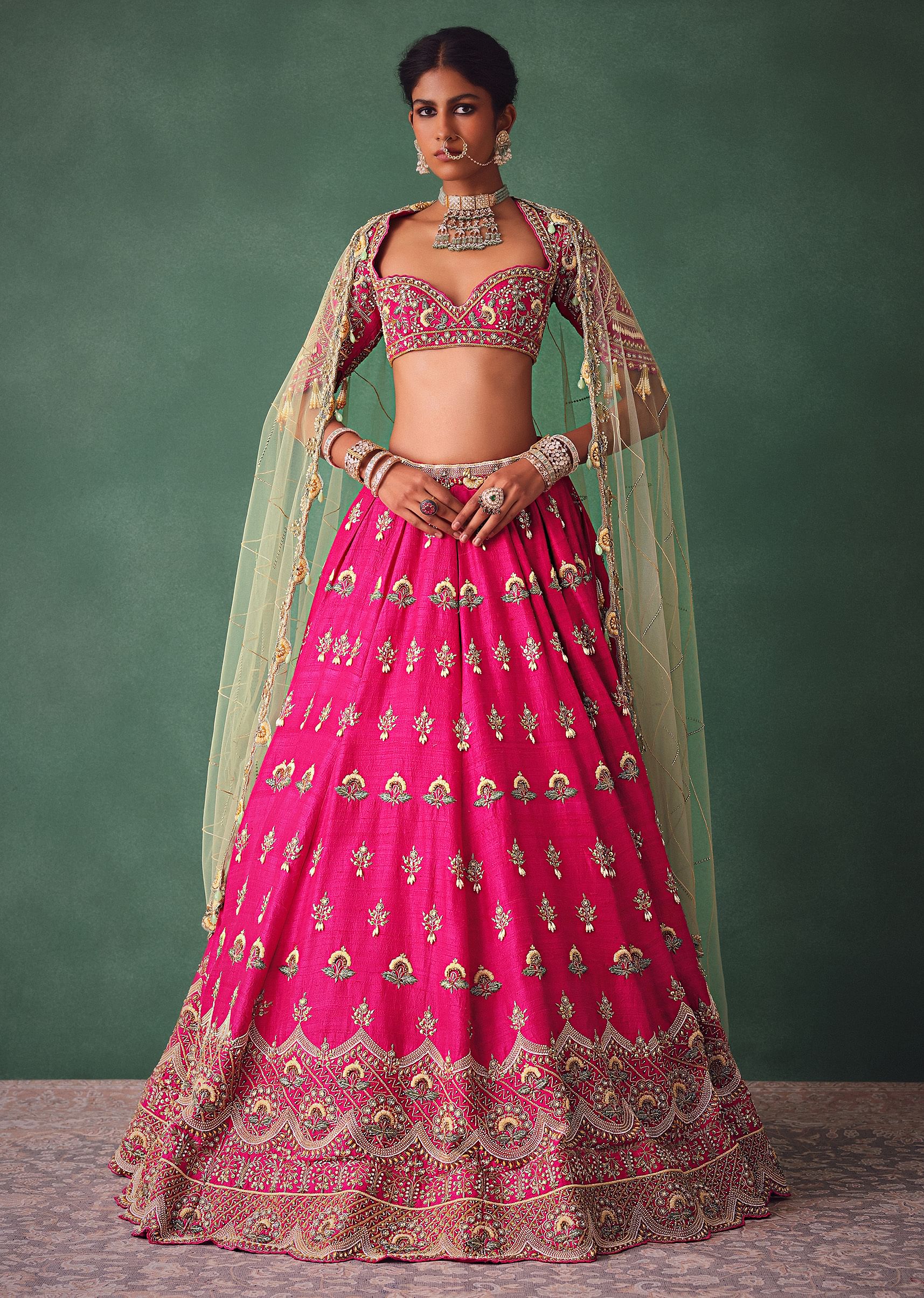 Deep Pink Bridal Butti Work Lehenga With Tassels on Blouse